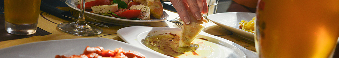 Eating Portuguese at Portas Da Cidade restaurant in Westport, MA.